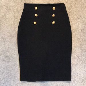 black midi skirt with gold buttons